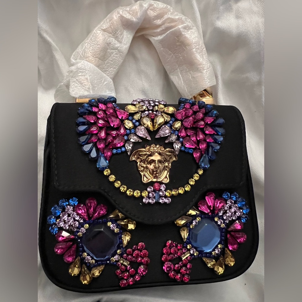 Versace bag comes with tags and dust bag